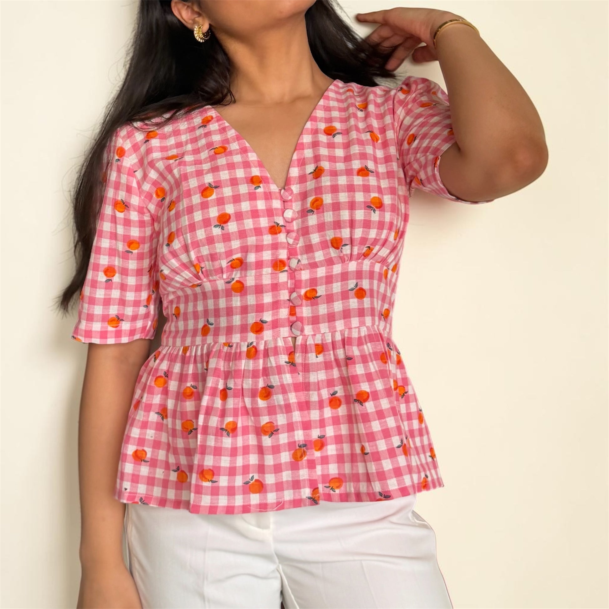 Gingham Peach Top detail — fabric-covered button detailing, cotton-linen top | Kodds